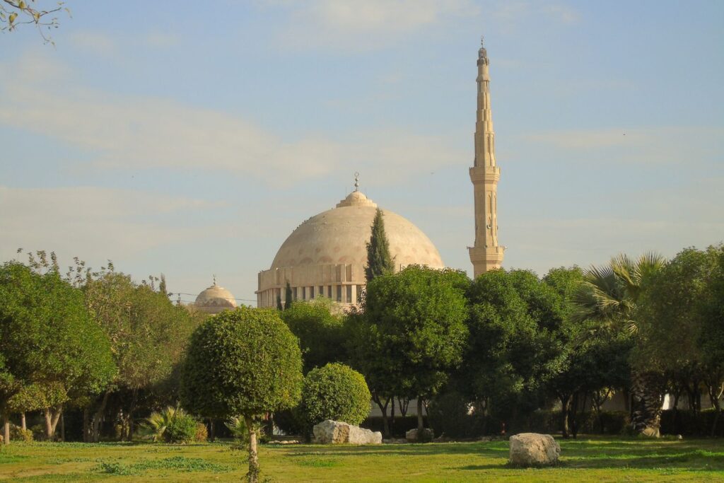 About Us Beautiful mosque in Baghdad showcasing traditional Islamic architecture and intricate design.